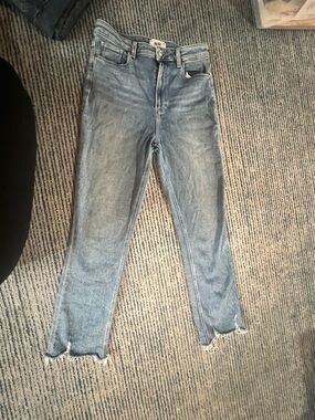 PAIGE High-Rise Faded Blue Skinny Jeans with Raw Hem